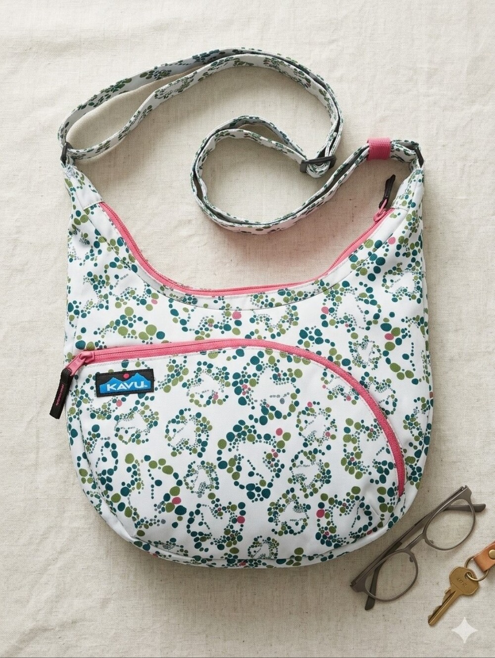 Kavu White Crossbody Bag with Green and Pink Dot Floral Print